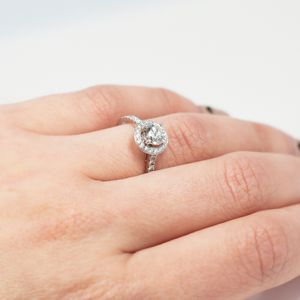 Platinum 0.70ct Canadian Arctic Round Brilliant Halo With Diamond Set Shoulders 