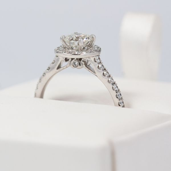 Platinum 0.70ct Canadian Arctic Round Brilliant Halo With Diamond Set Shoulders 